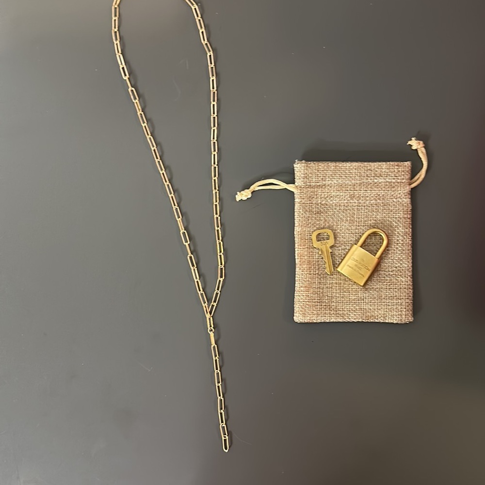 Authentic LV lock and key with chain.